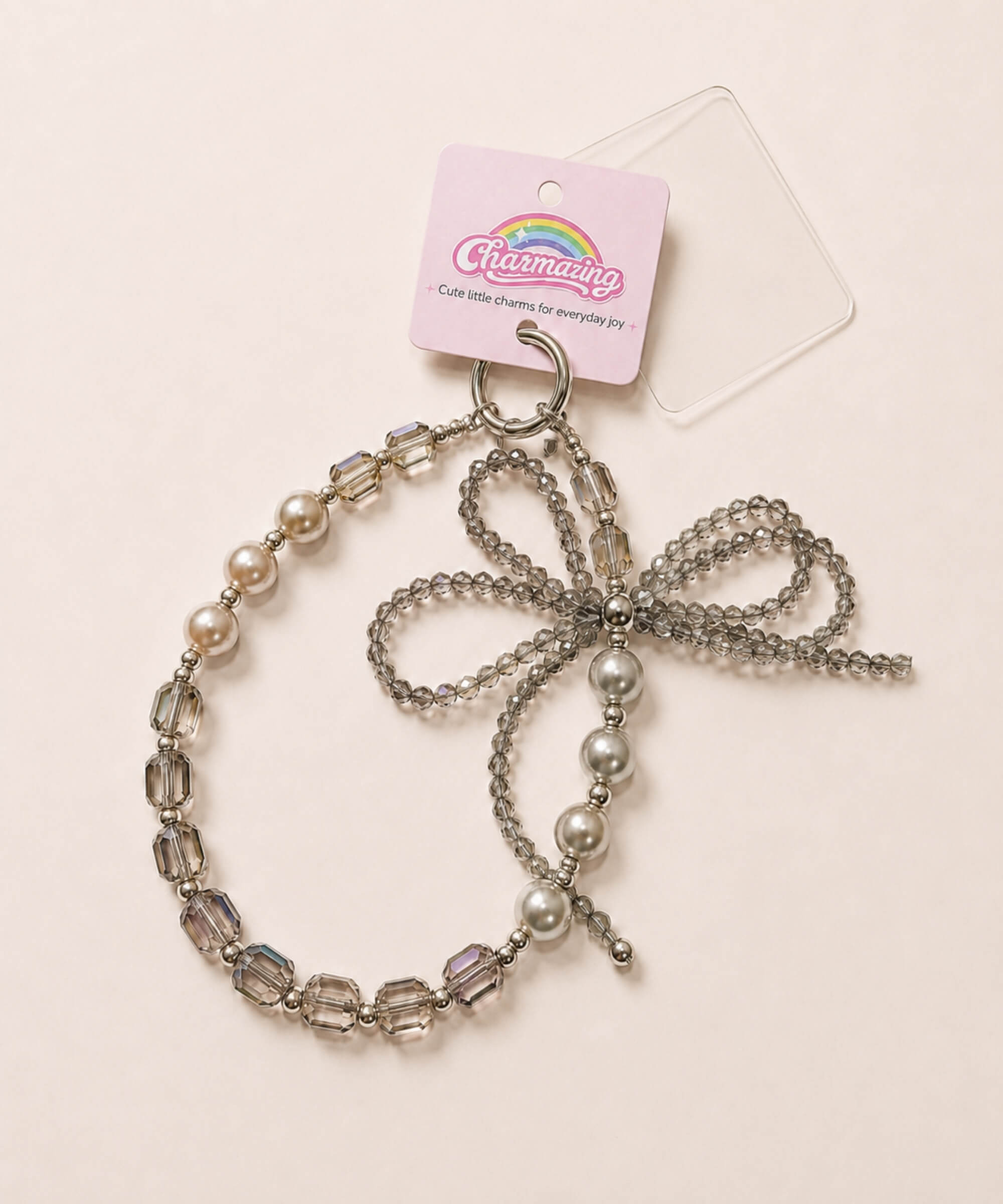 Grey ribbon bow beaded phone charm with pearl-look and crystal-style beads